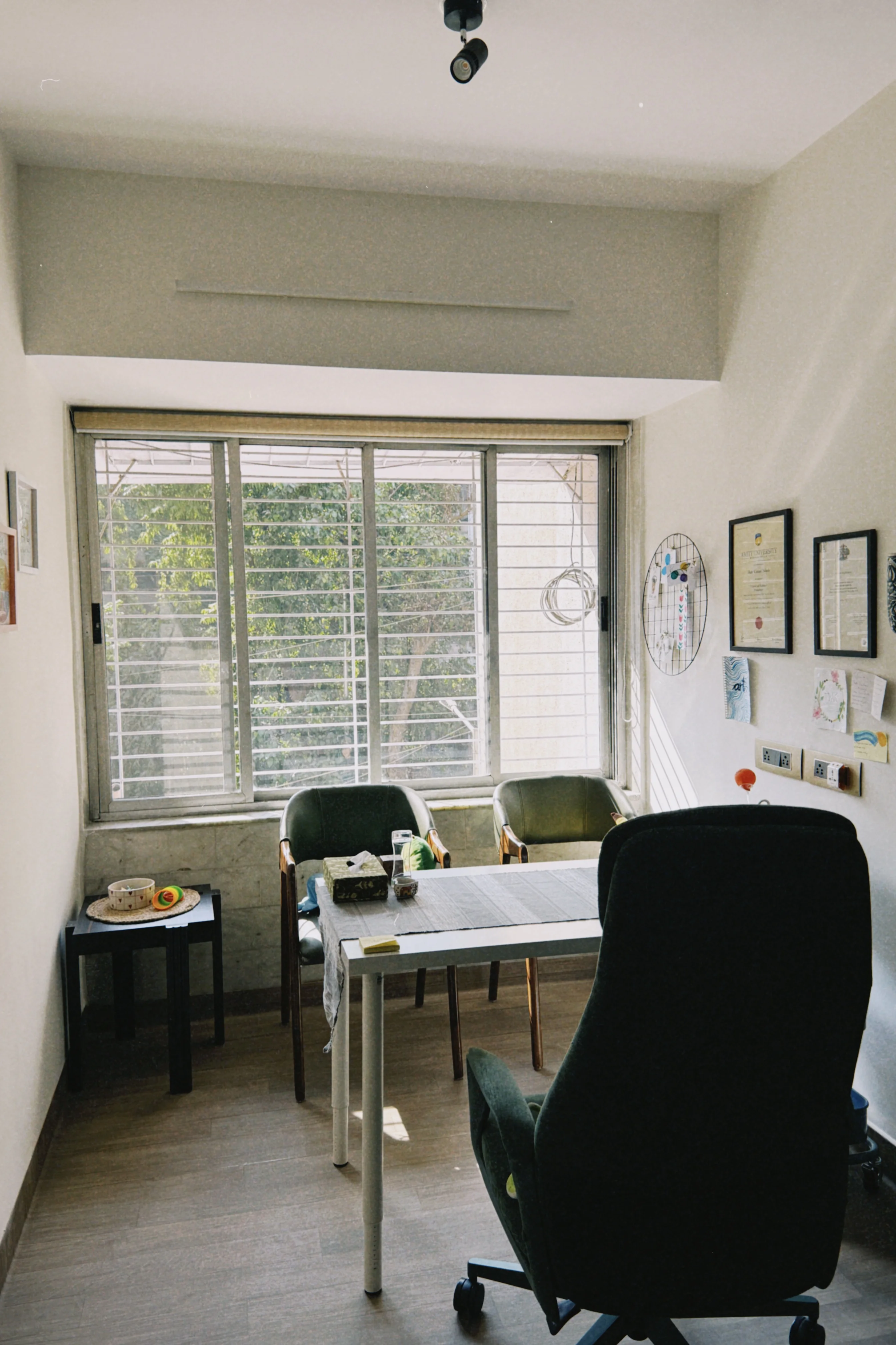 Therapy room with chairs and a large window