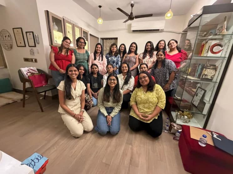 A seated group at a Therapy with Kinnari workshop